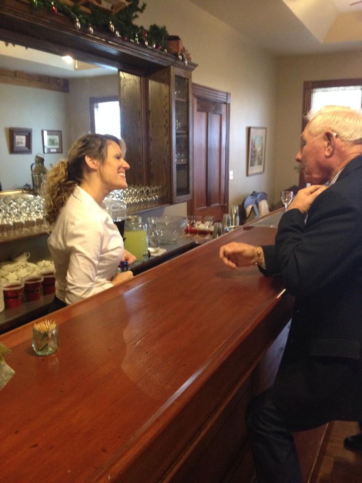 Gentleman speaking to bartender 